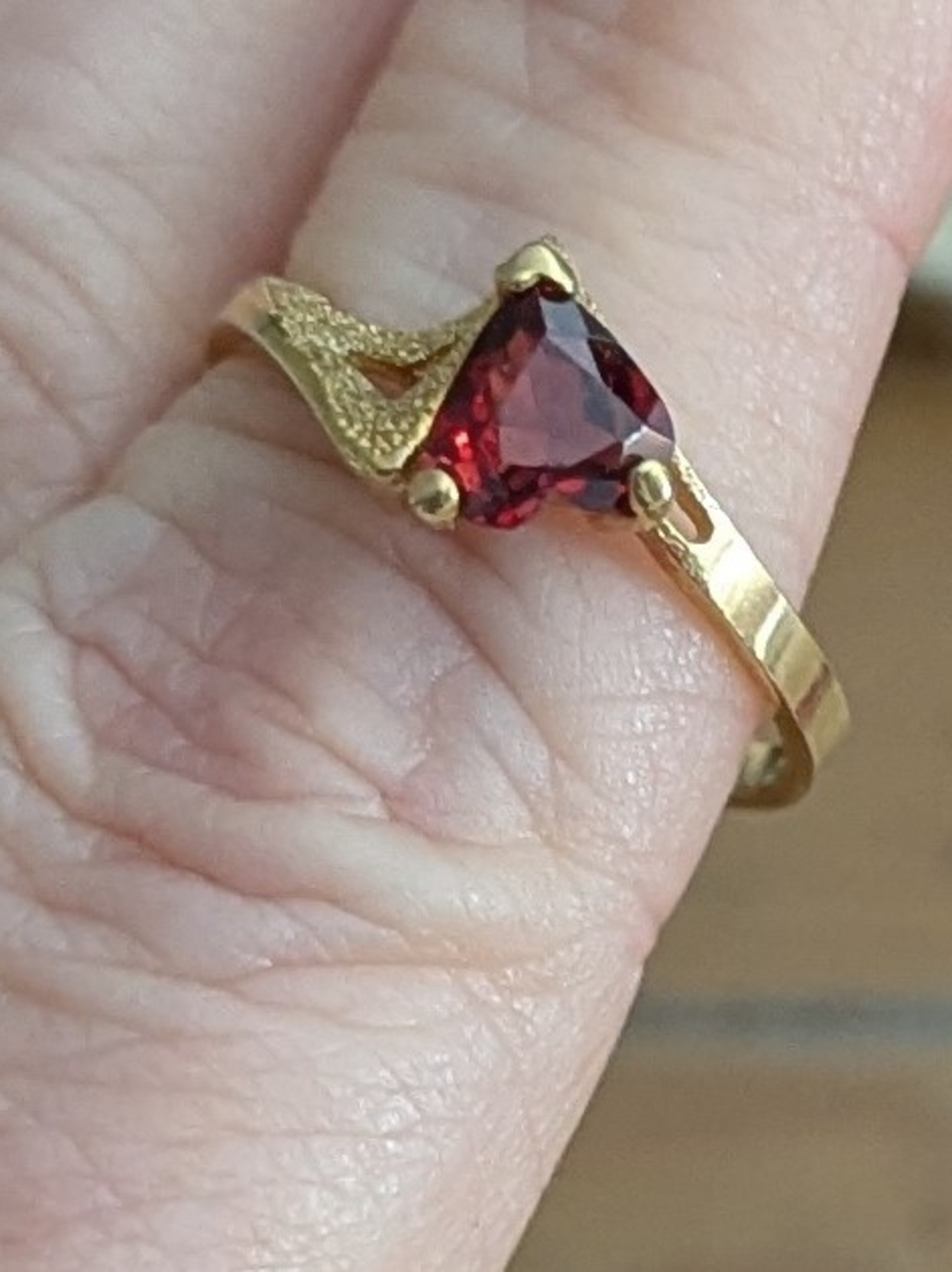 Gold Ring with Deep Red Heart Gemstone
